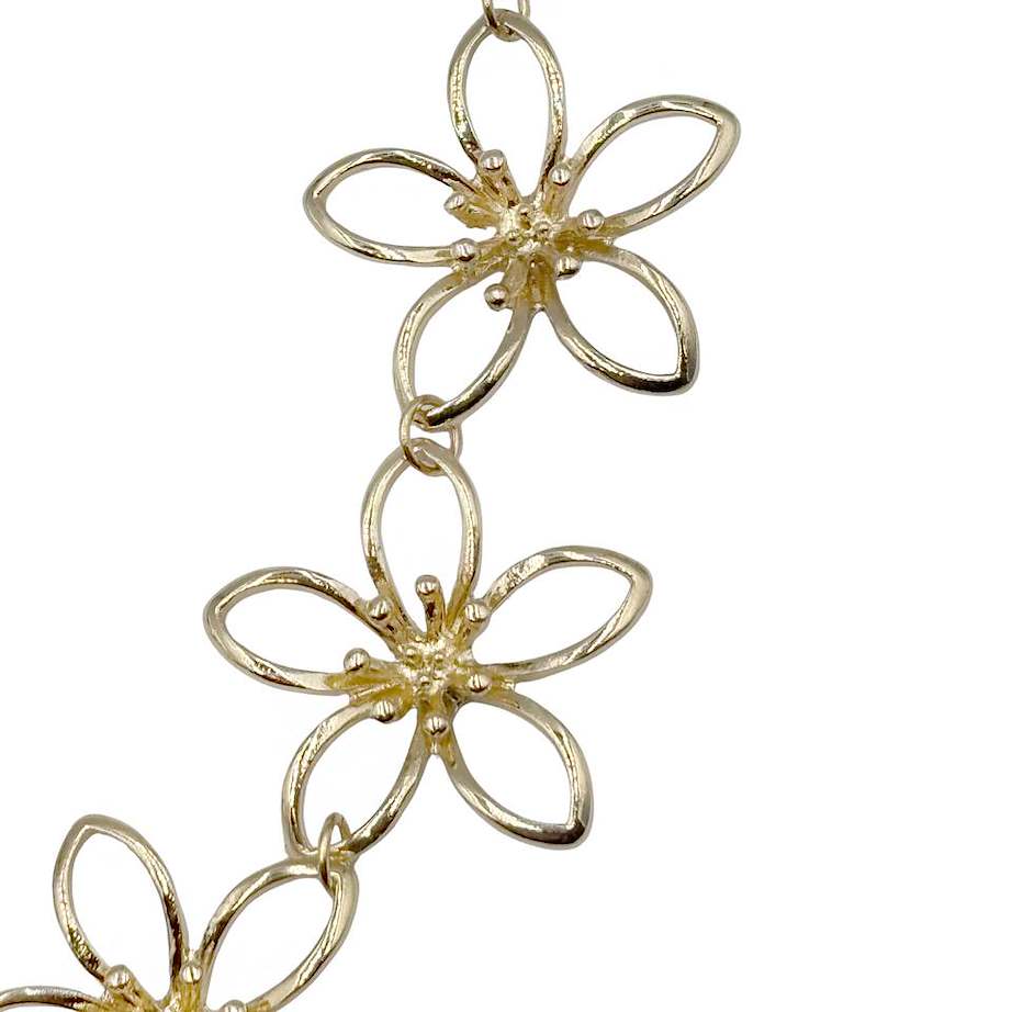 Set Collar y Aretes Flores Dorado