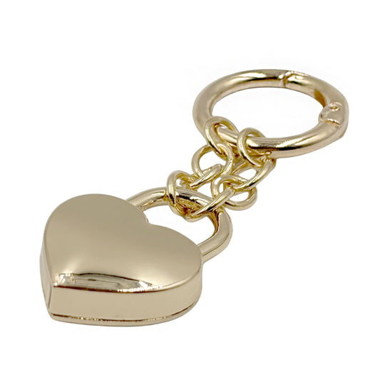 Llavero de corazón dorado